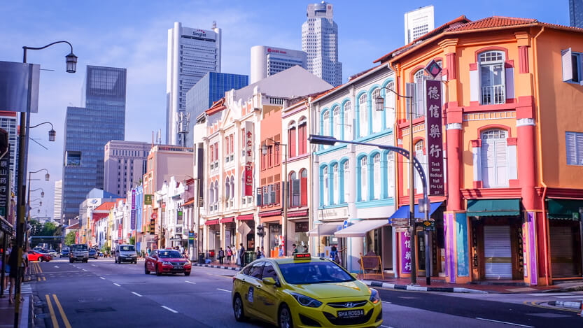 Cars driving in Chinatown Singapore